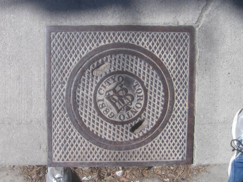 [Toronto sewer grate]