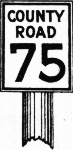 [Early county road marker]